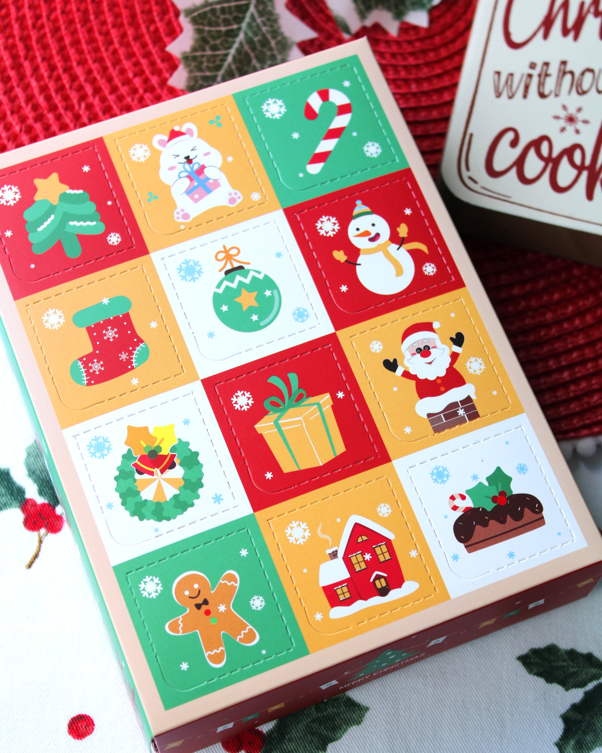 Christmas-themed advent calendar with colorful designs on a festive background.